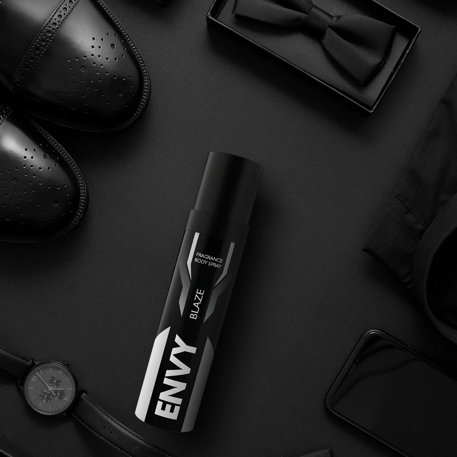 Man applying ENVY Blaze Nano Deodorant – pocket-size body spray for men with bold, fiery fragrance.